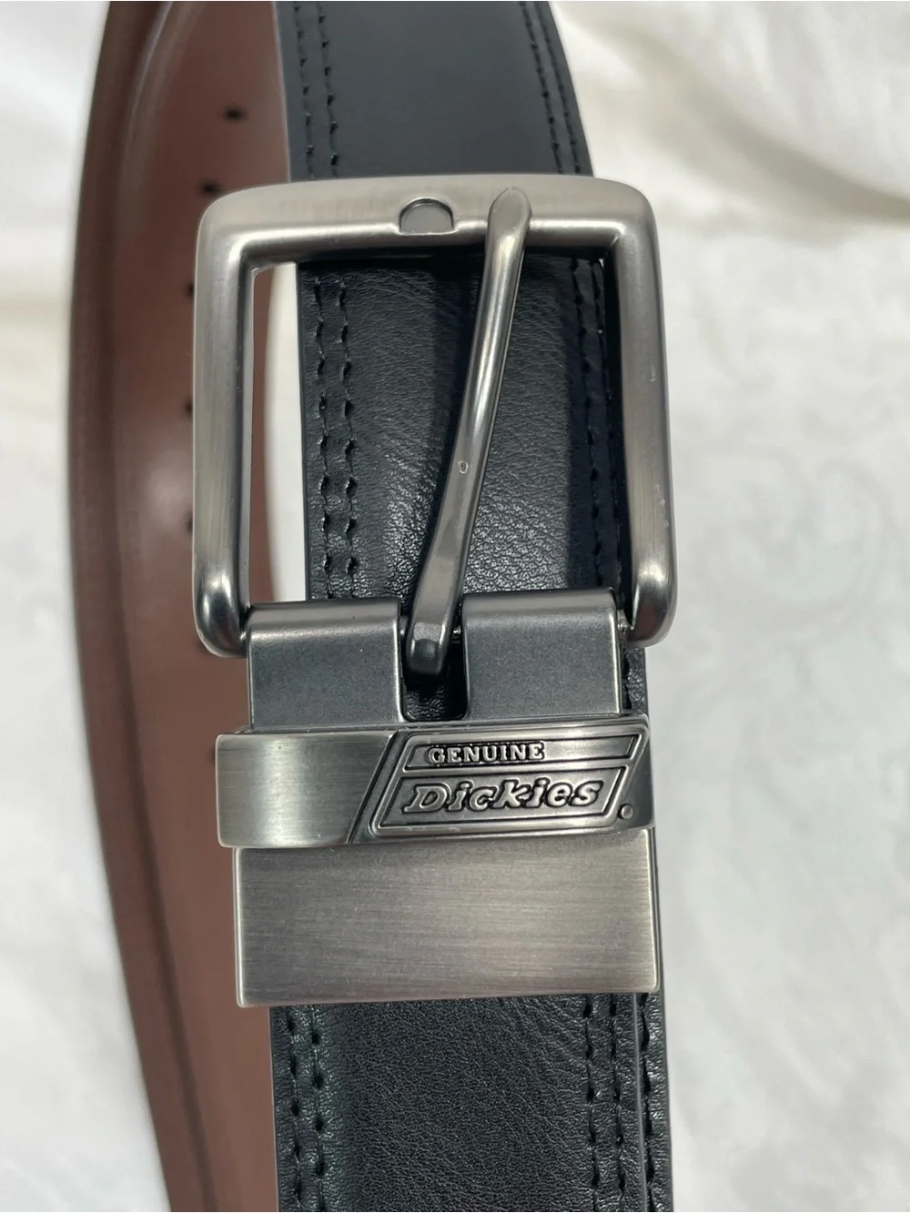 Dickies Black Leather Belt with Silver Tone Metal Buckle.